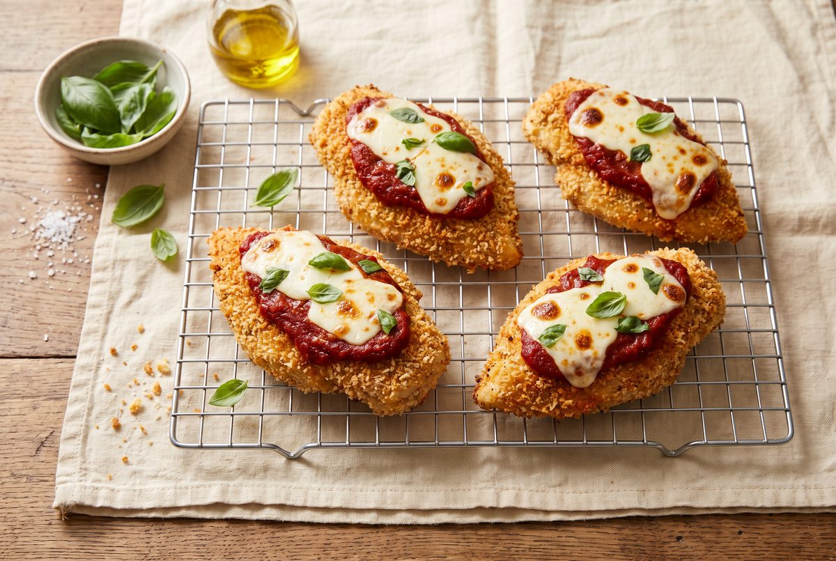 Marinara and melted mozzarella on the baked chicken, just out of the oven