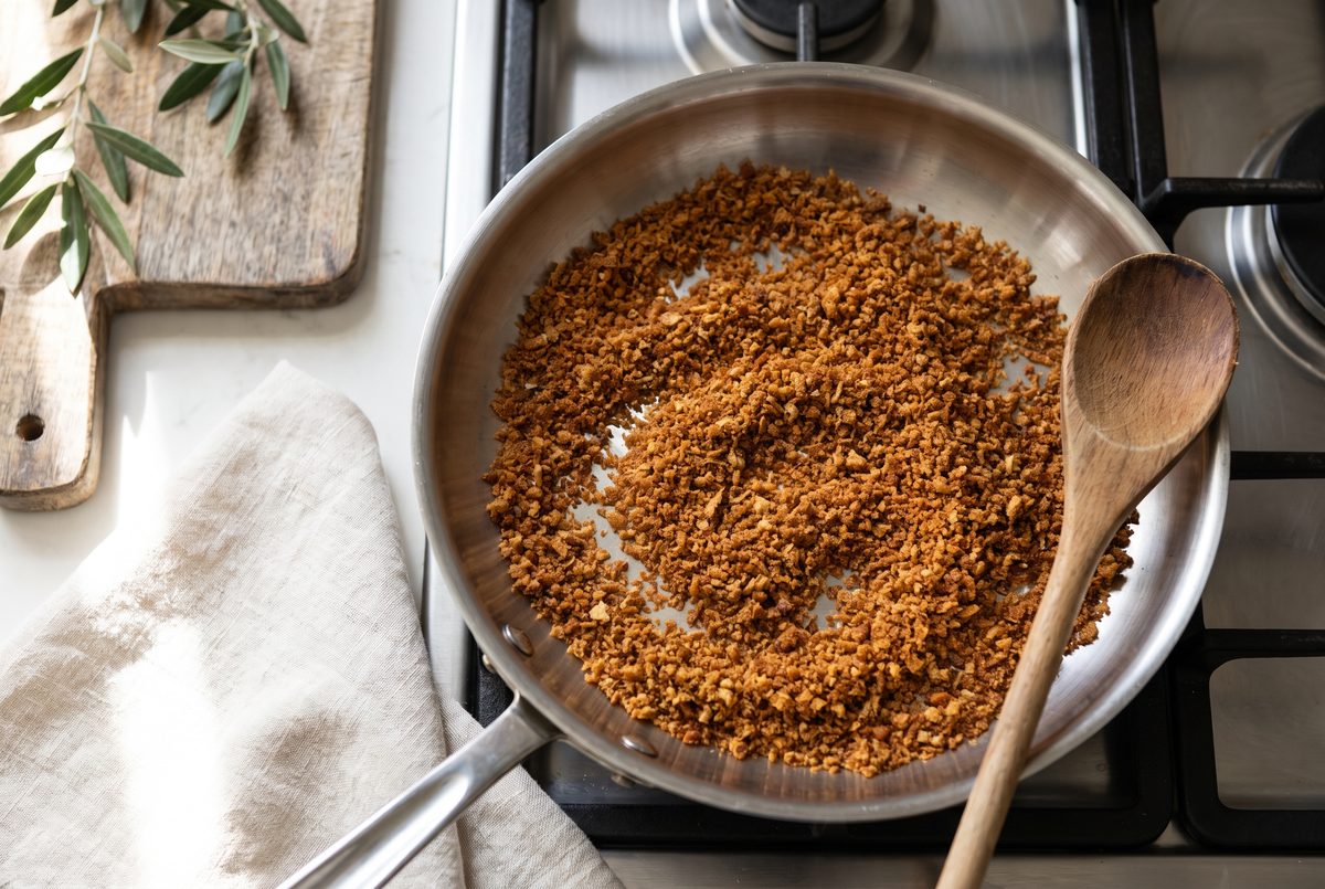 Coarse breadcrumbs toasted to a deep golden brown in a shallow pan